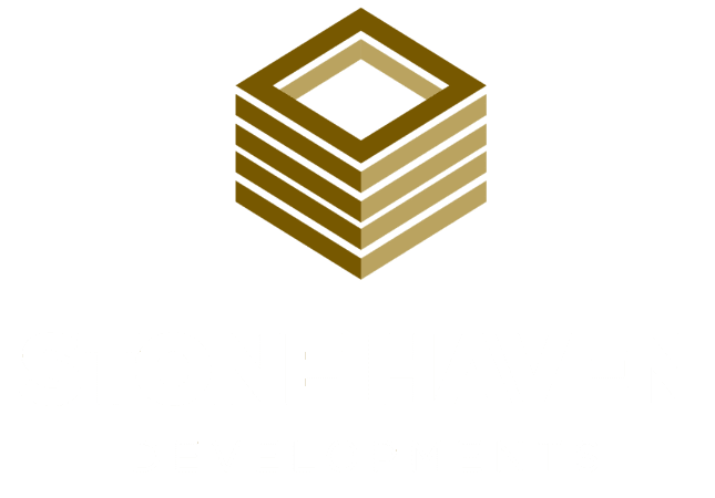Stone Haven Developments Logo for Stone Haven Developments featuring a stacked, cube-shaped, gold and brown icon above the bold white company name, reflecting Stone Haven Developments’ modern and sophisticated brand identity. Ontario