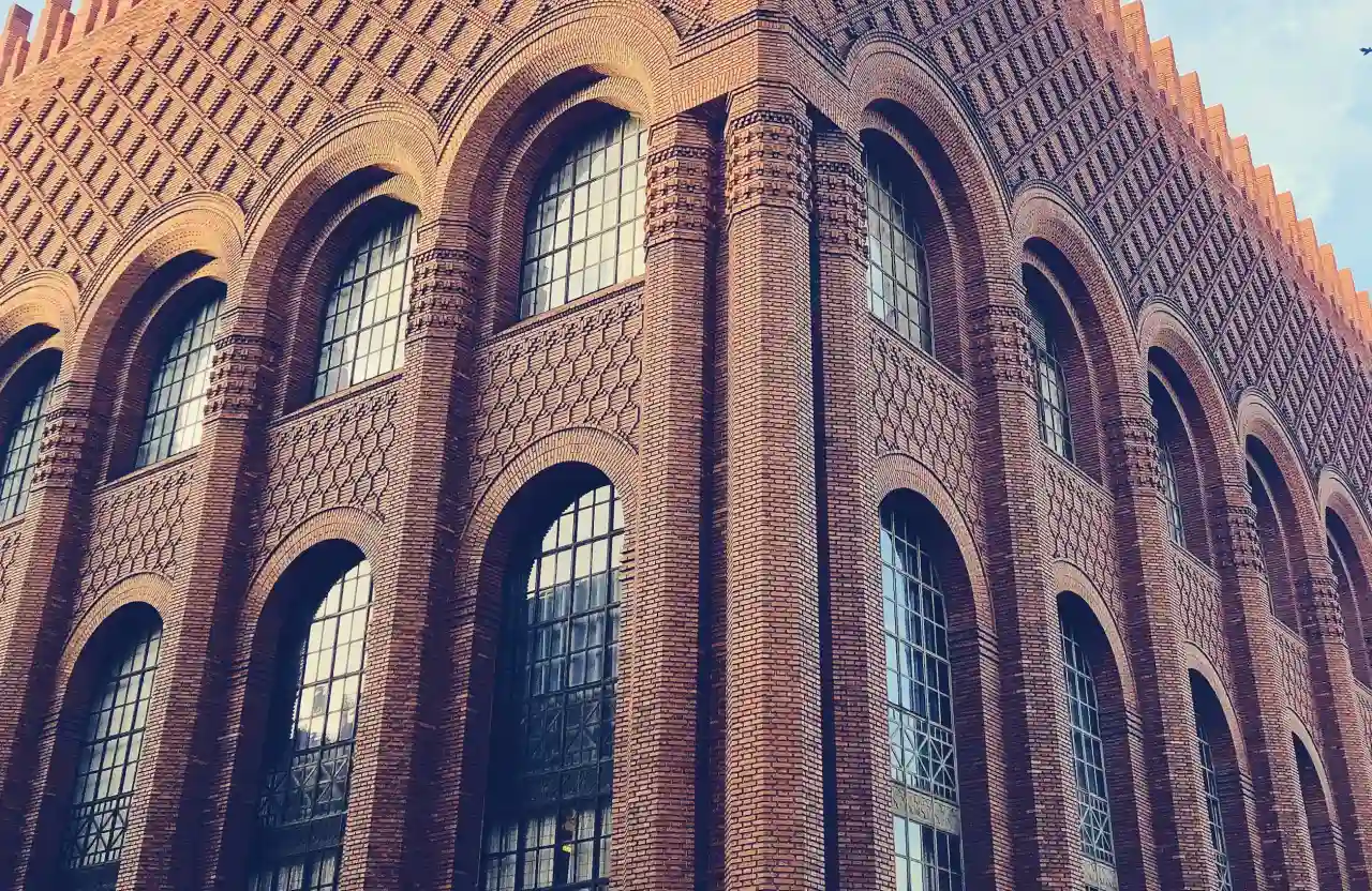 Institutional masonry contractors in Canada building a brick facade for a school project